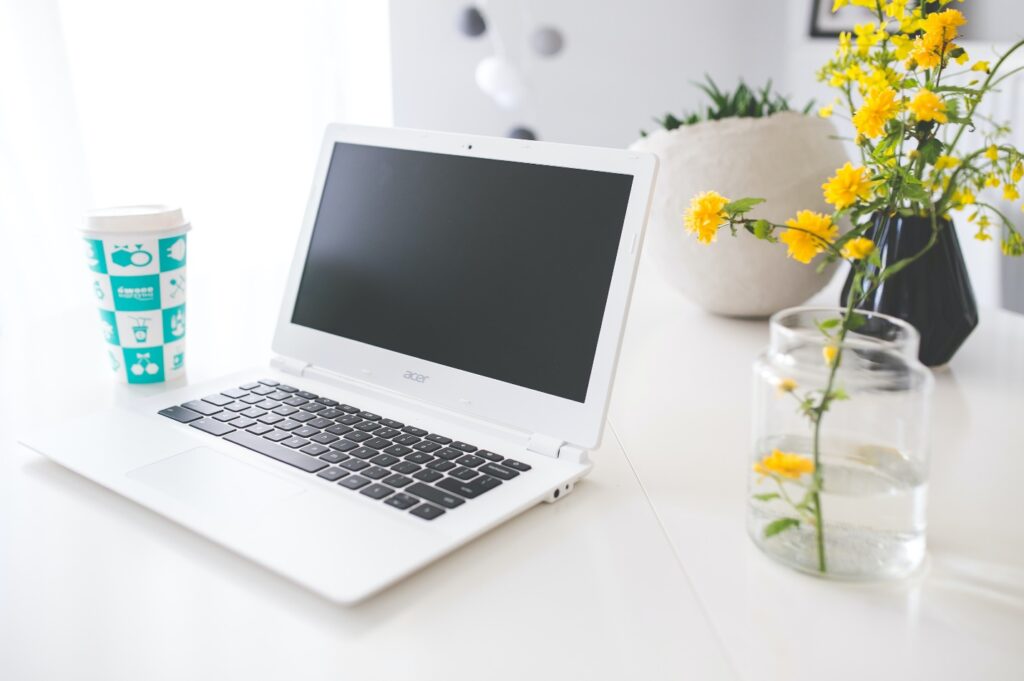 Acer Chromebook on a white desk